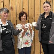Otter founder Marilyn White (centre) with Abbie White and Julie Spurway with the new mugs