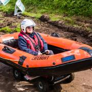 Alice Dutton of Sidmouth Lifeboat taking part in the Otterton Soap Box Derby on Easter Monday